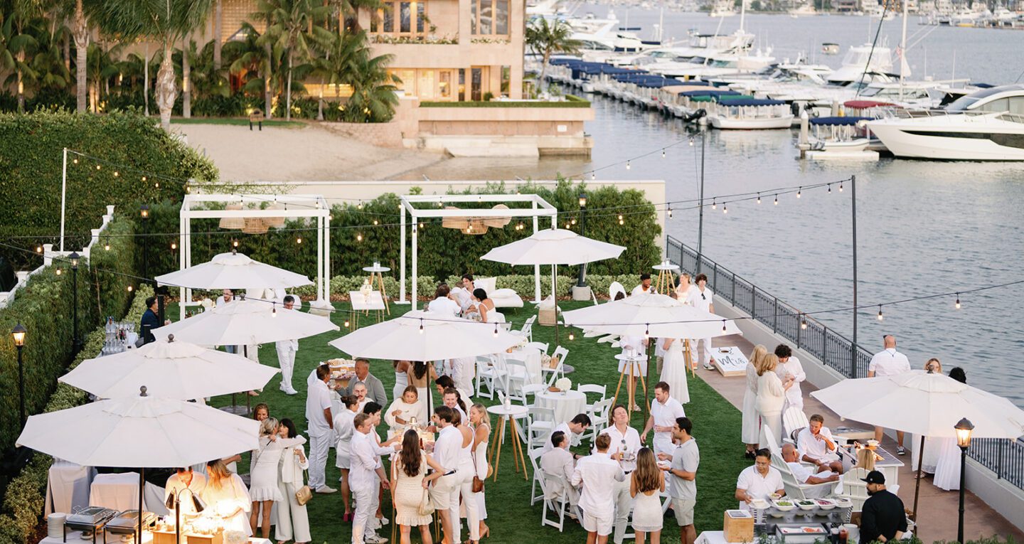 an outdoor event with umbrellas